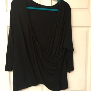 Black 3/4 sleeve soft shirt. Wrap style